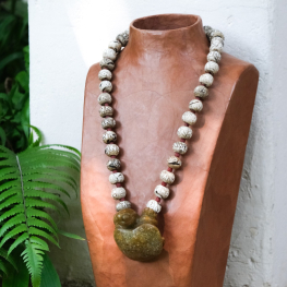 Antique conch shell bead necklace with a handcrafted jade turtle pendant