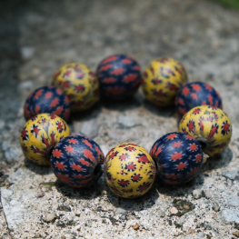 Antique peacock tail bead bracelet - yellow & blue