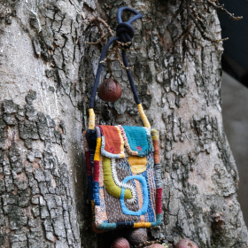 Spine and stitch hand-stitched natural dyed pouch bag - 4